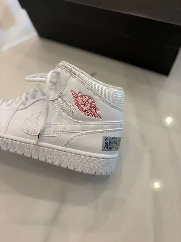 Jordan 1 mid swoosh on tour