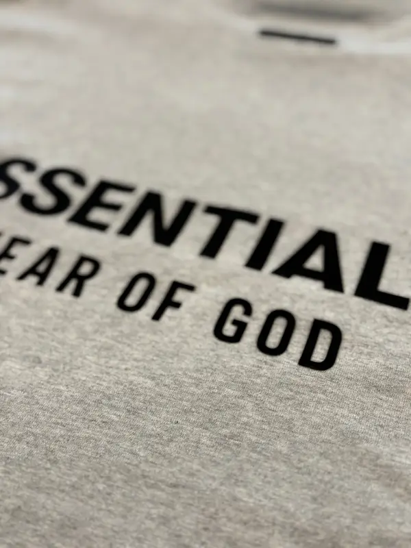 Fear of God Essentials light heather grey crewneck tee