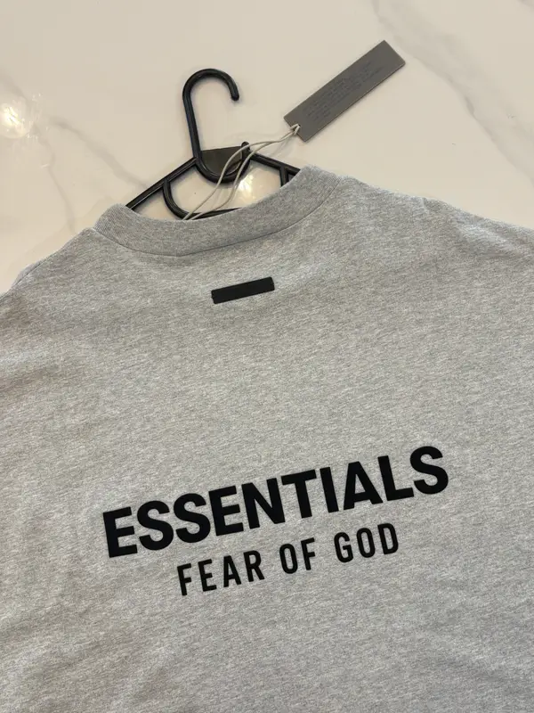 Fear of God Essentials light heather grey crewneck tee
