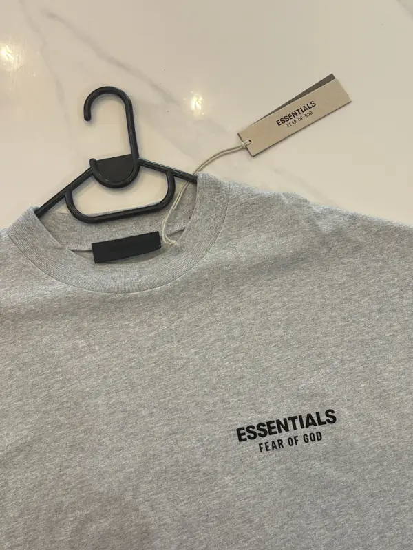 Fear of God Essentials light heather grey crewneck tee