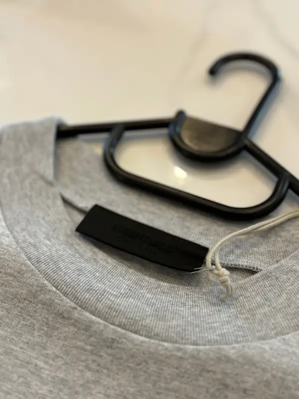 Fear of God Essentials light heather grey crewneck tee