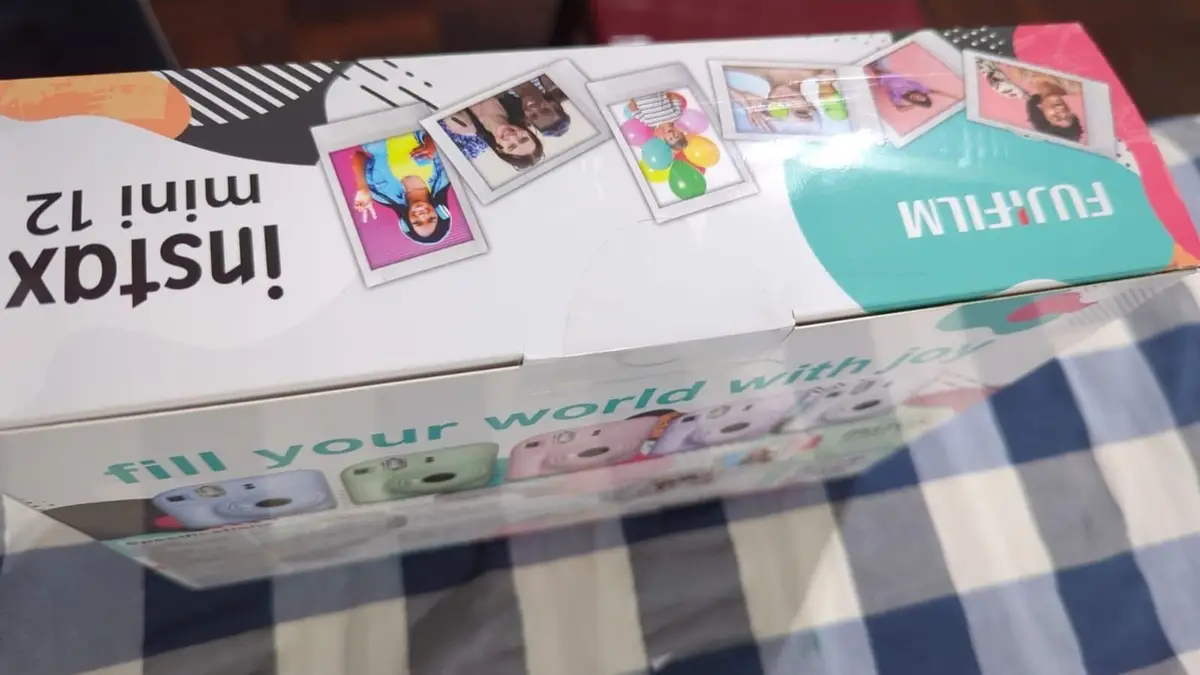 Brand new unopened instax mini 12 . The seal is still on !!!