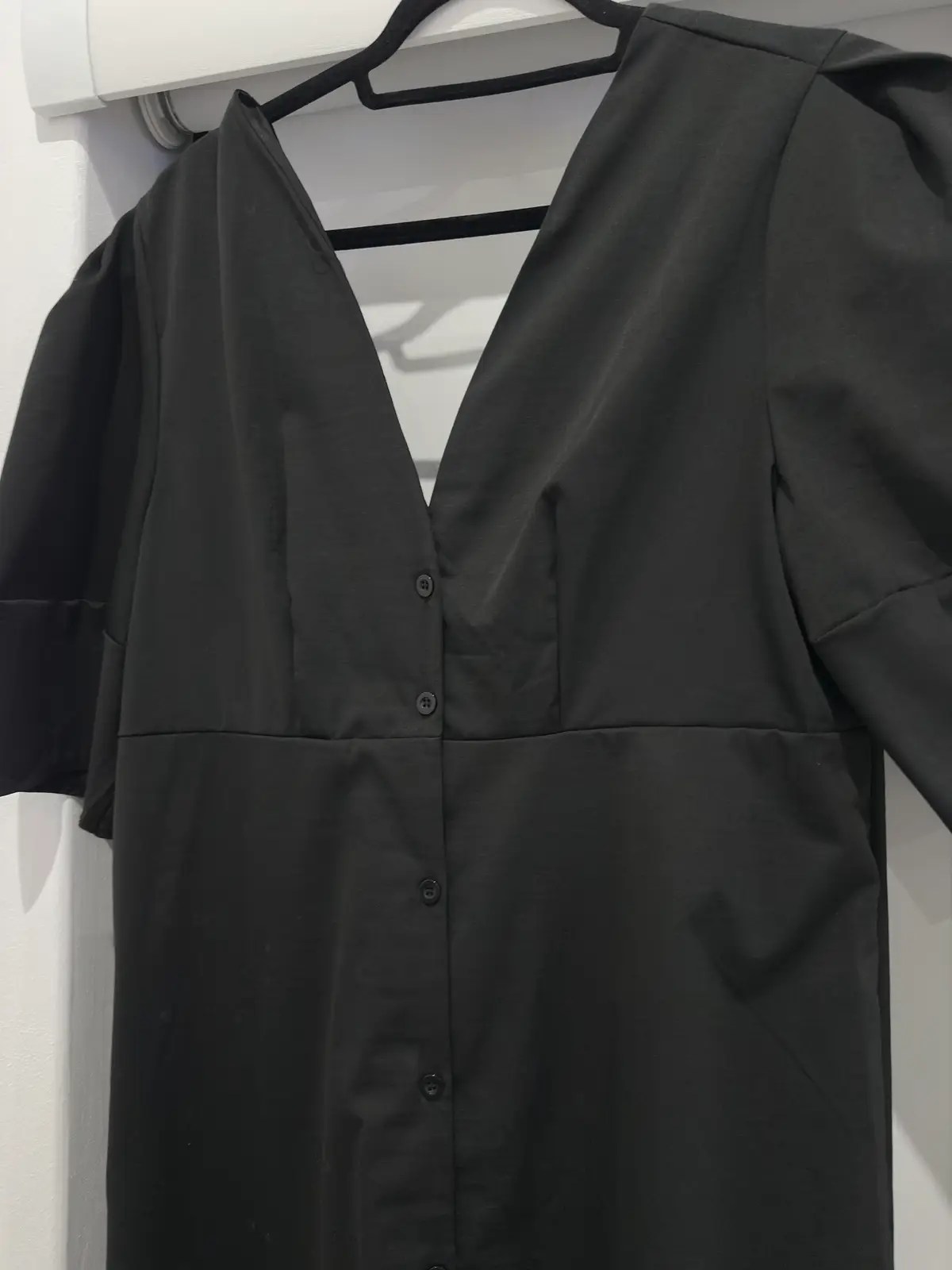 STARA Buttoned-down black low neck dress