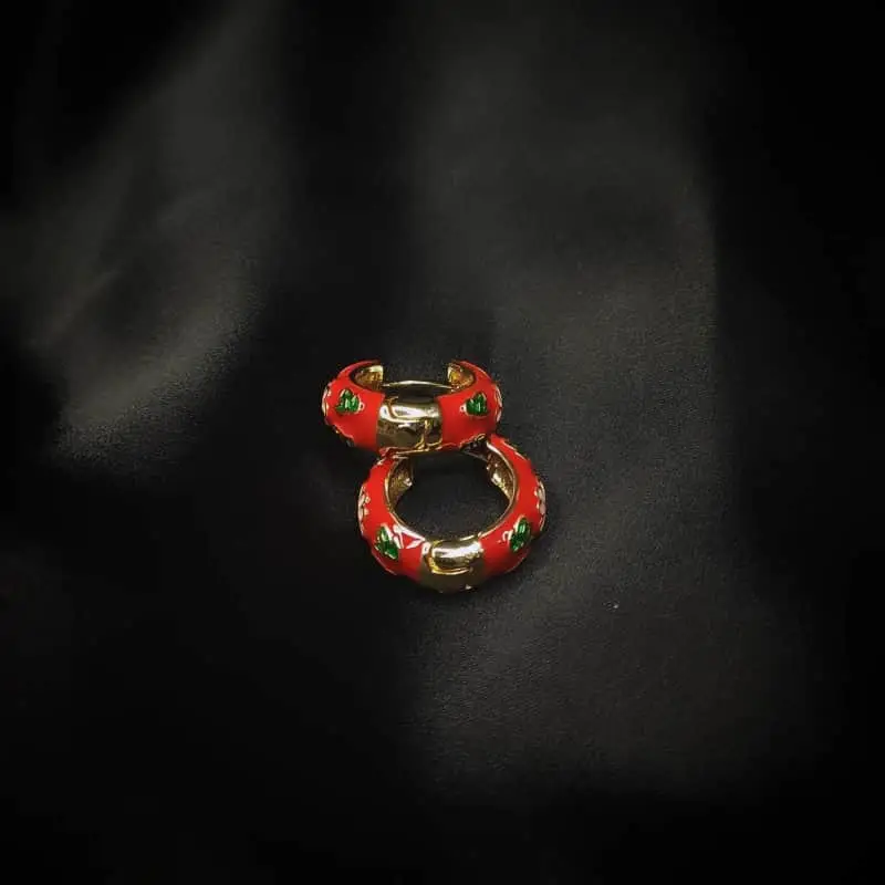 Red Enamel Hoop Earrings with pink and green floral design