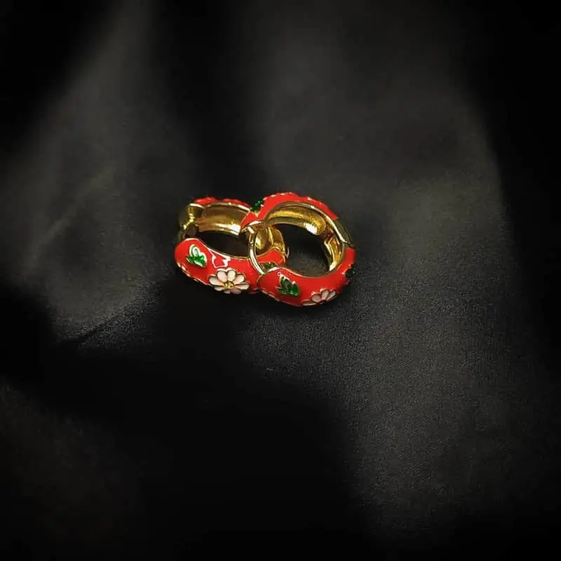 Red Enamel Hoop Earrings with pink and green floral design