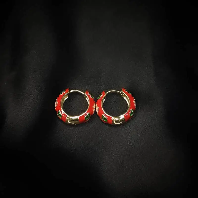 Red Enamel Hoop Earrings with pink and green floral design
