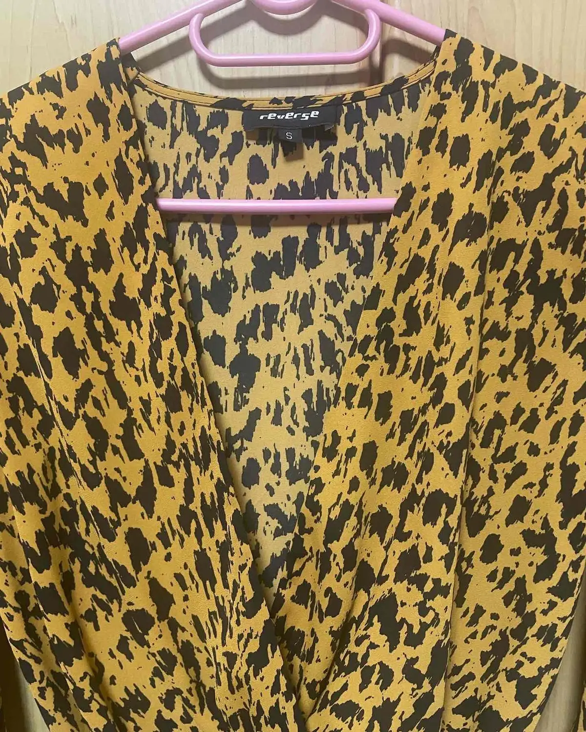 Reverse Leopard Print Long Sleeve Bodysuit