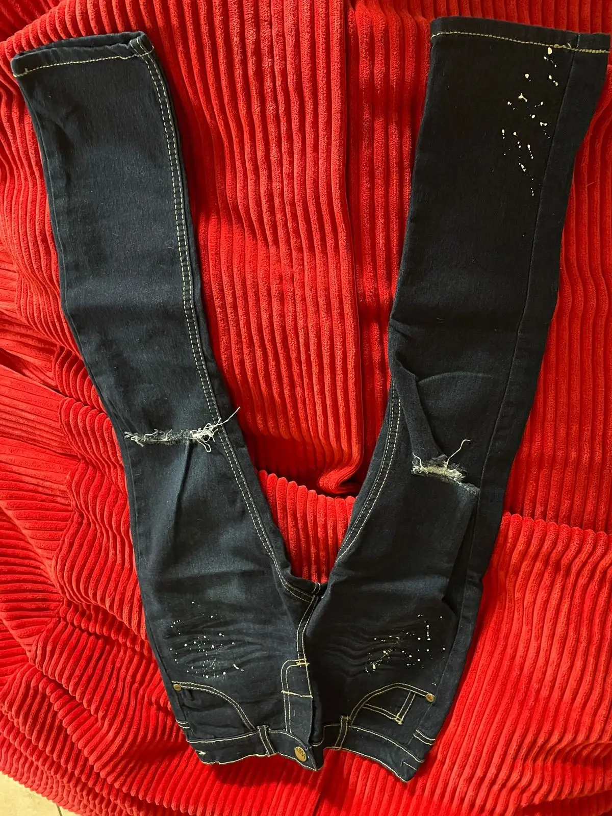 Generic Dark Wash Distressed Jeans with Paint Splatter