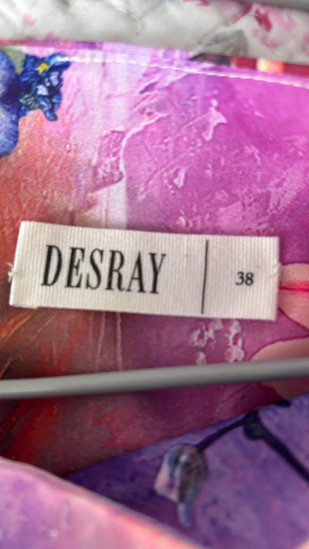 Beautiful vibrantly colourful Desray designer dress