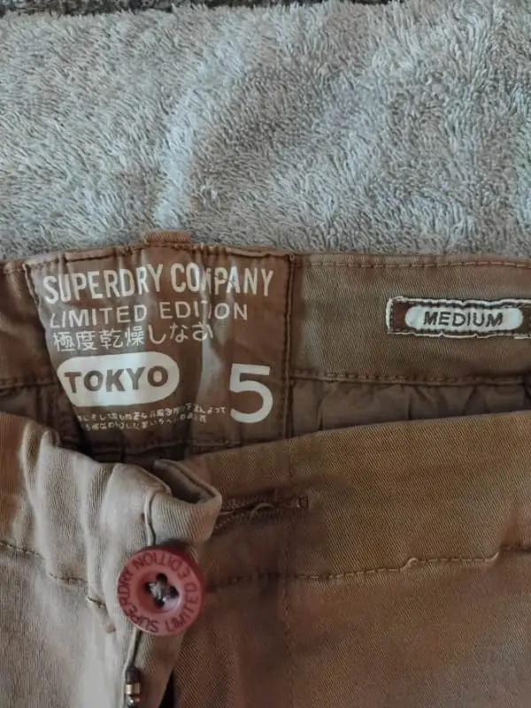 Superdry "limited edition" tan coloured Chino style pants.