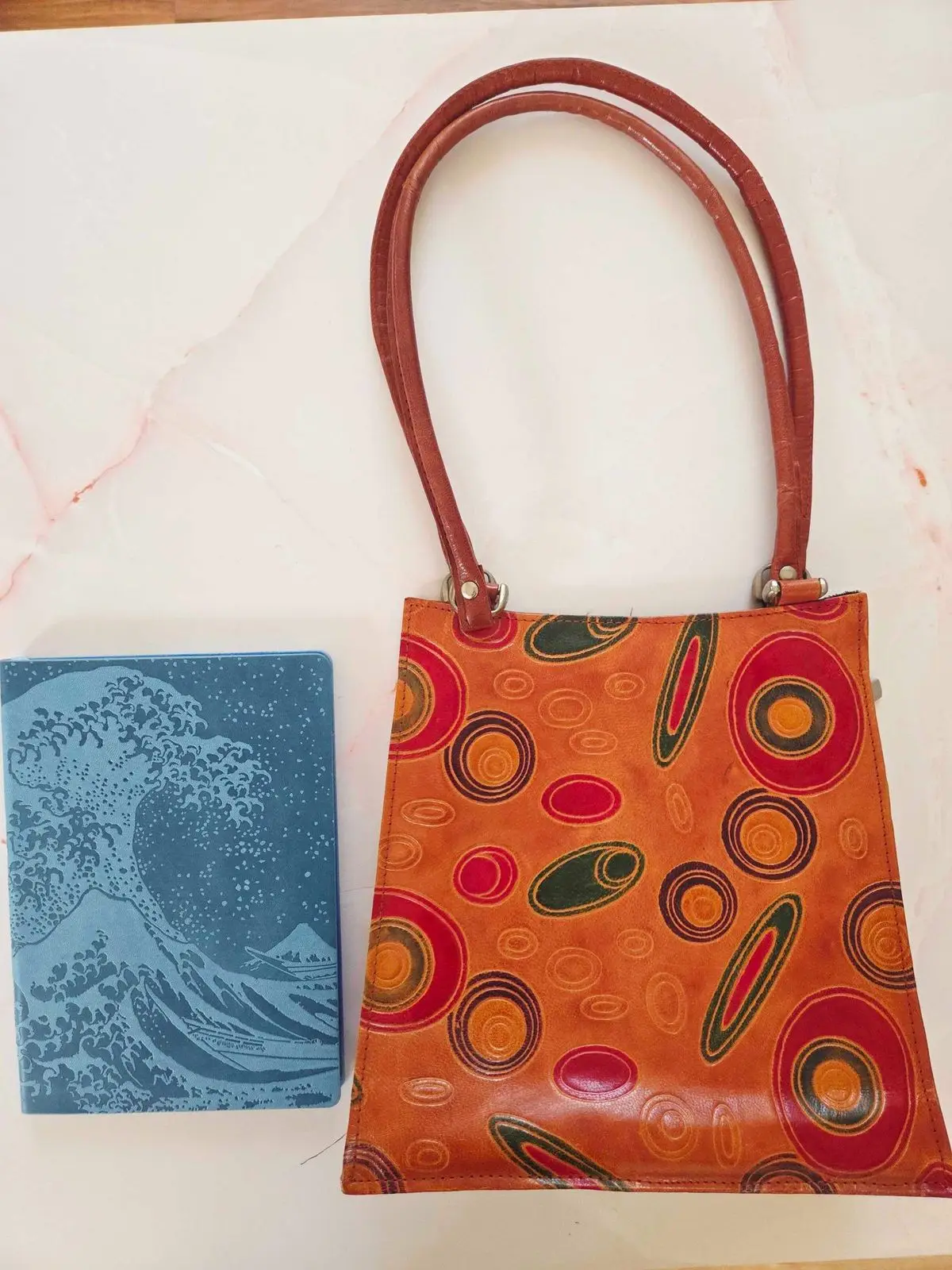 Vintage Orange Leather Handbag with Geometric Circle Pattern