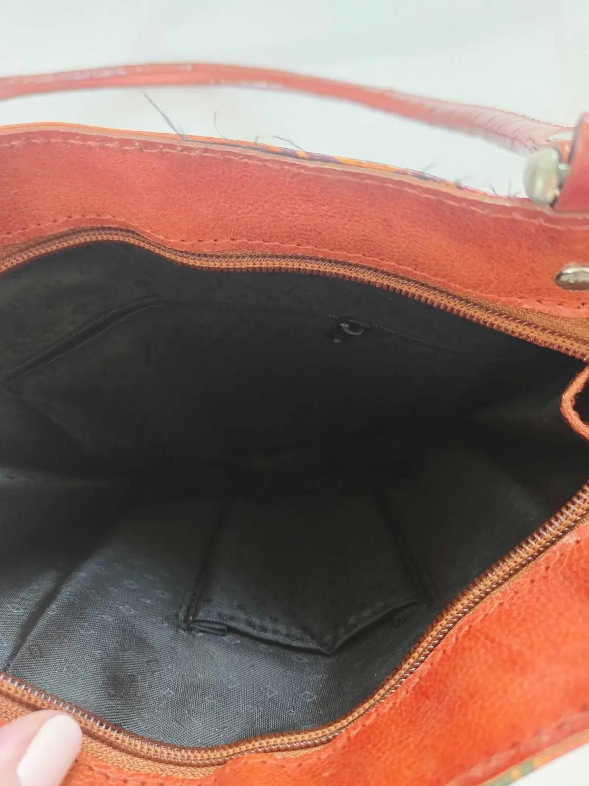 Vintage Orange Leather Handbag with Geometric Circle Pattern