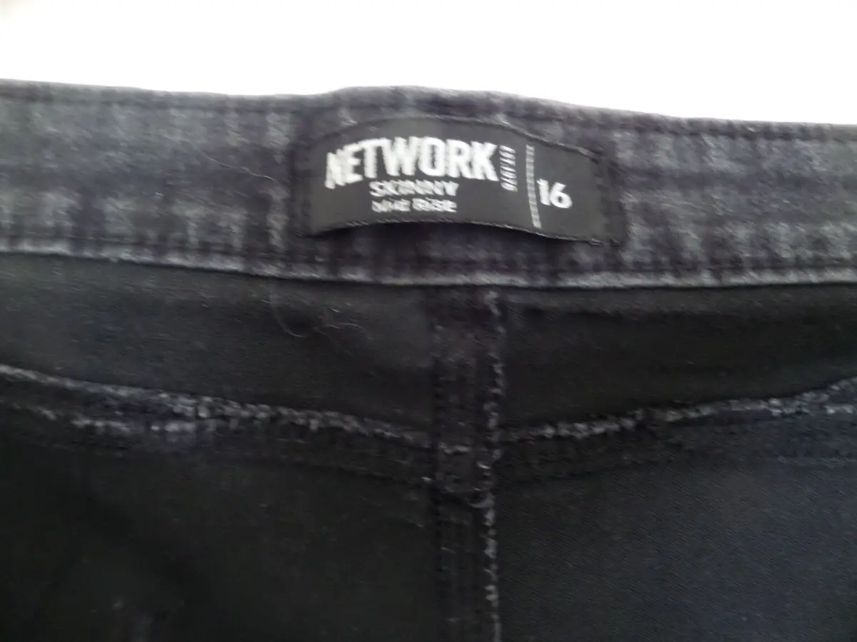 Network Skinny Mid Rise Black Jeans