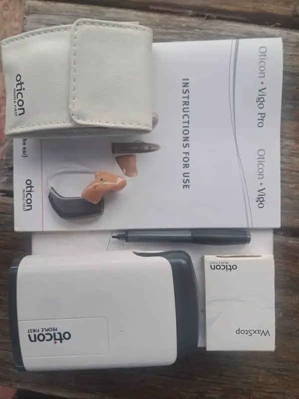 Oticon vigo Pro hearing aid with all accessories.