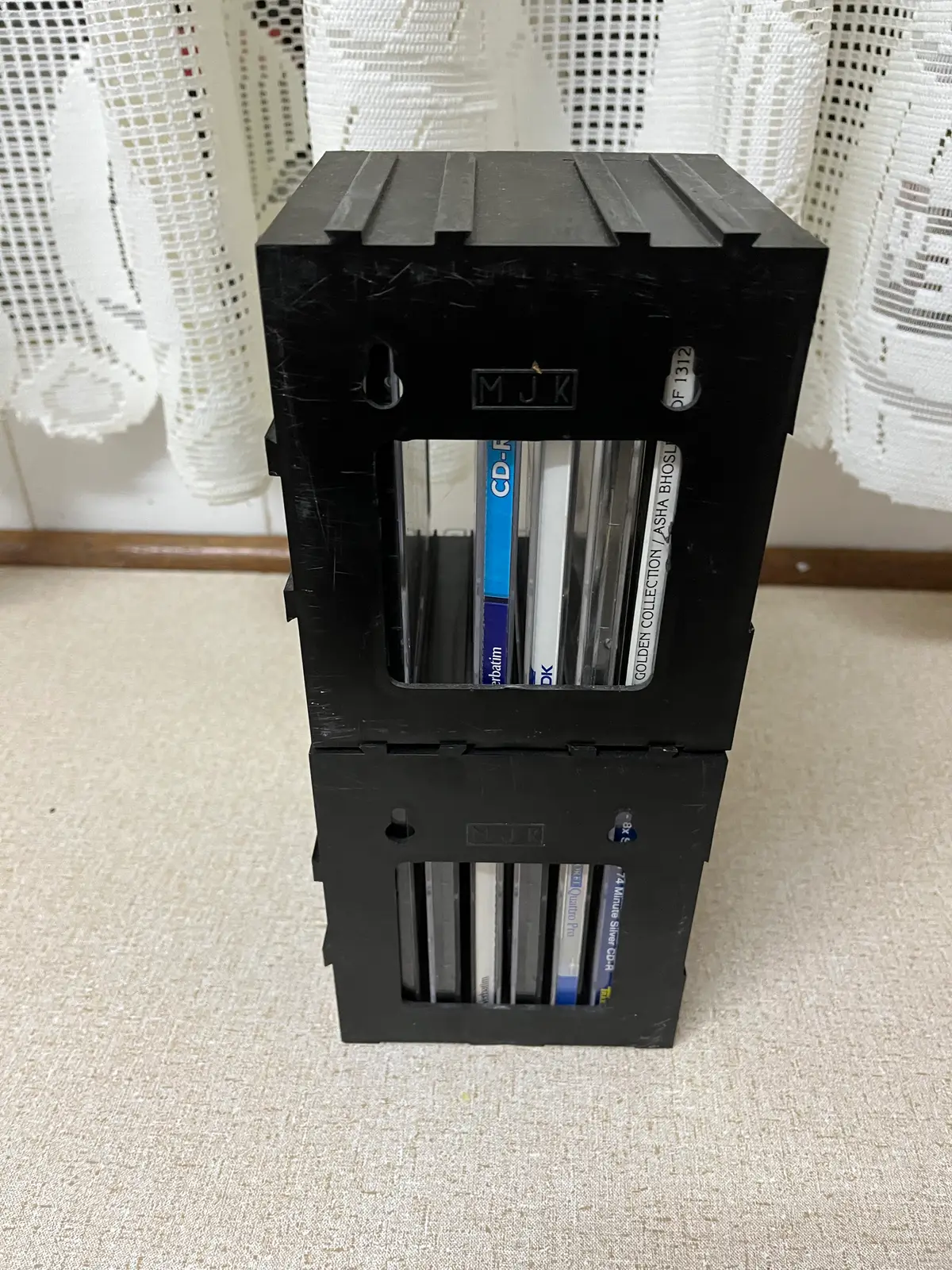 CD RACKS SET OF FOUR . Empty 32 CD covers also