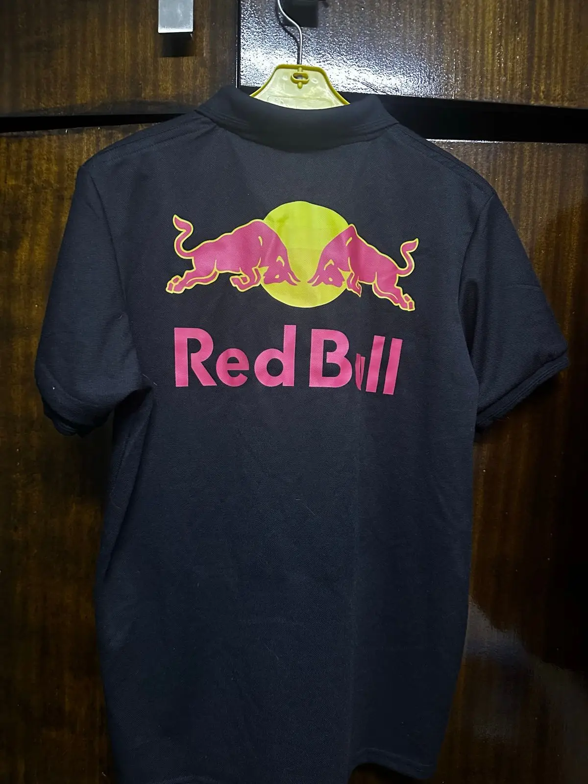 Black Polo Shirt with Red Bull Logo