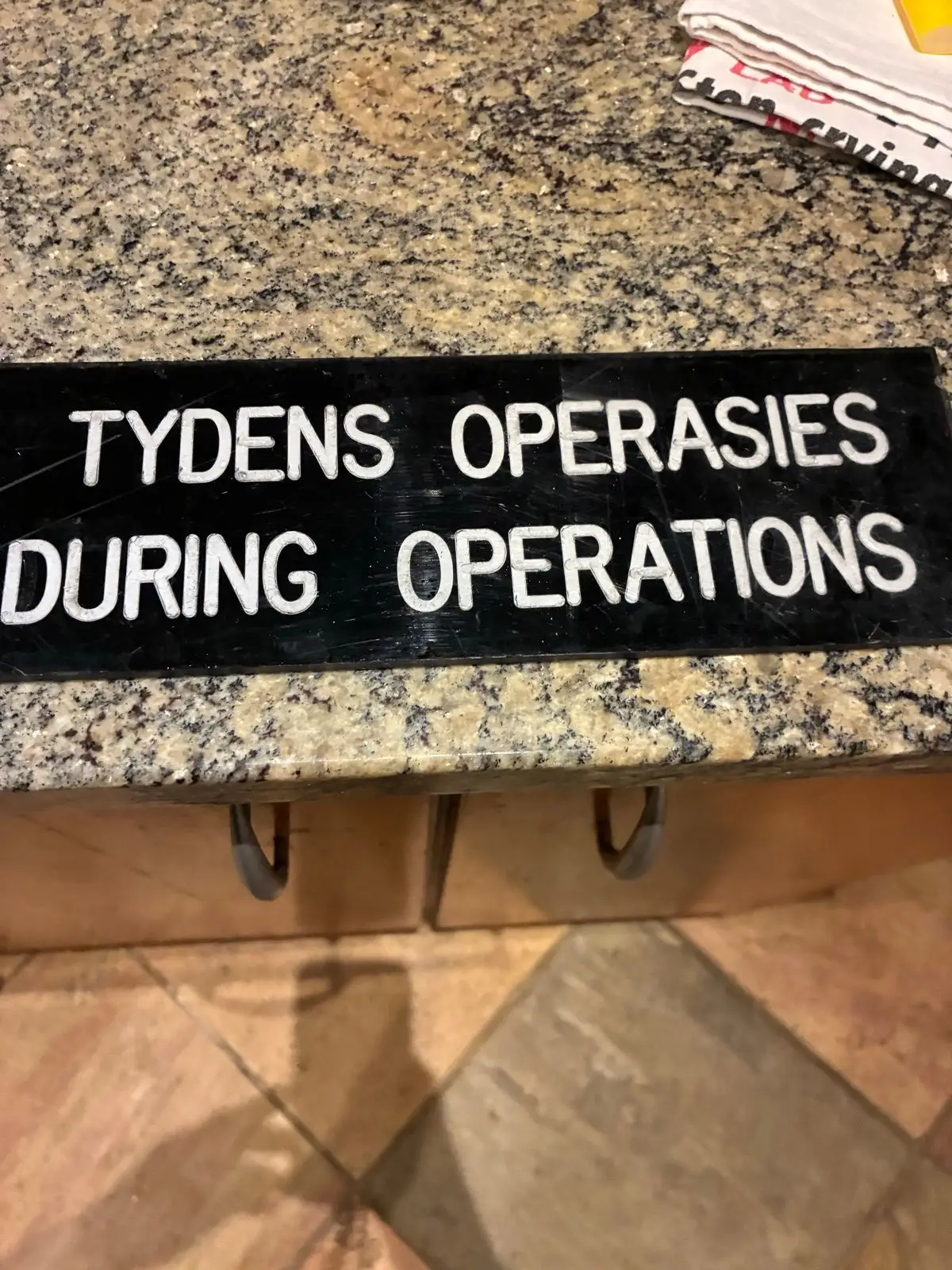 Black 'Do Not Open' Sign