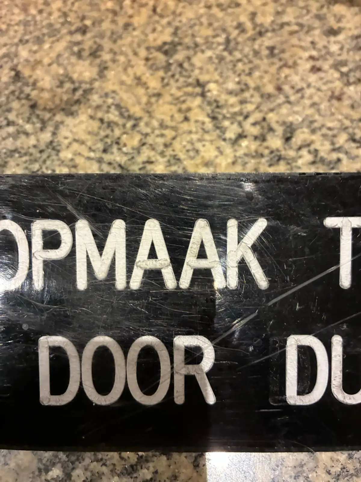 Black 'Do Not Open' Sign