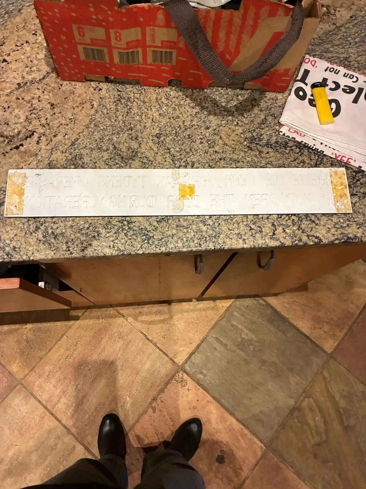 Black 'Do Not Open' Sign