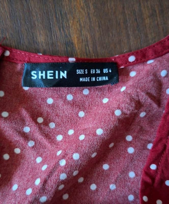 red and white polka dot romper from Shein.