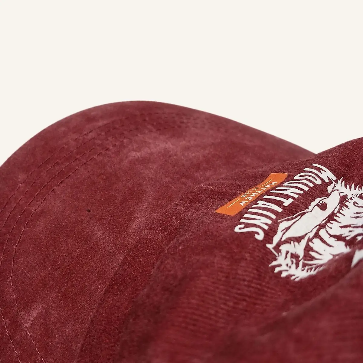 Burgundy Suede Cap with Embroidered Graphic