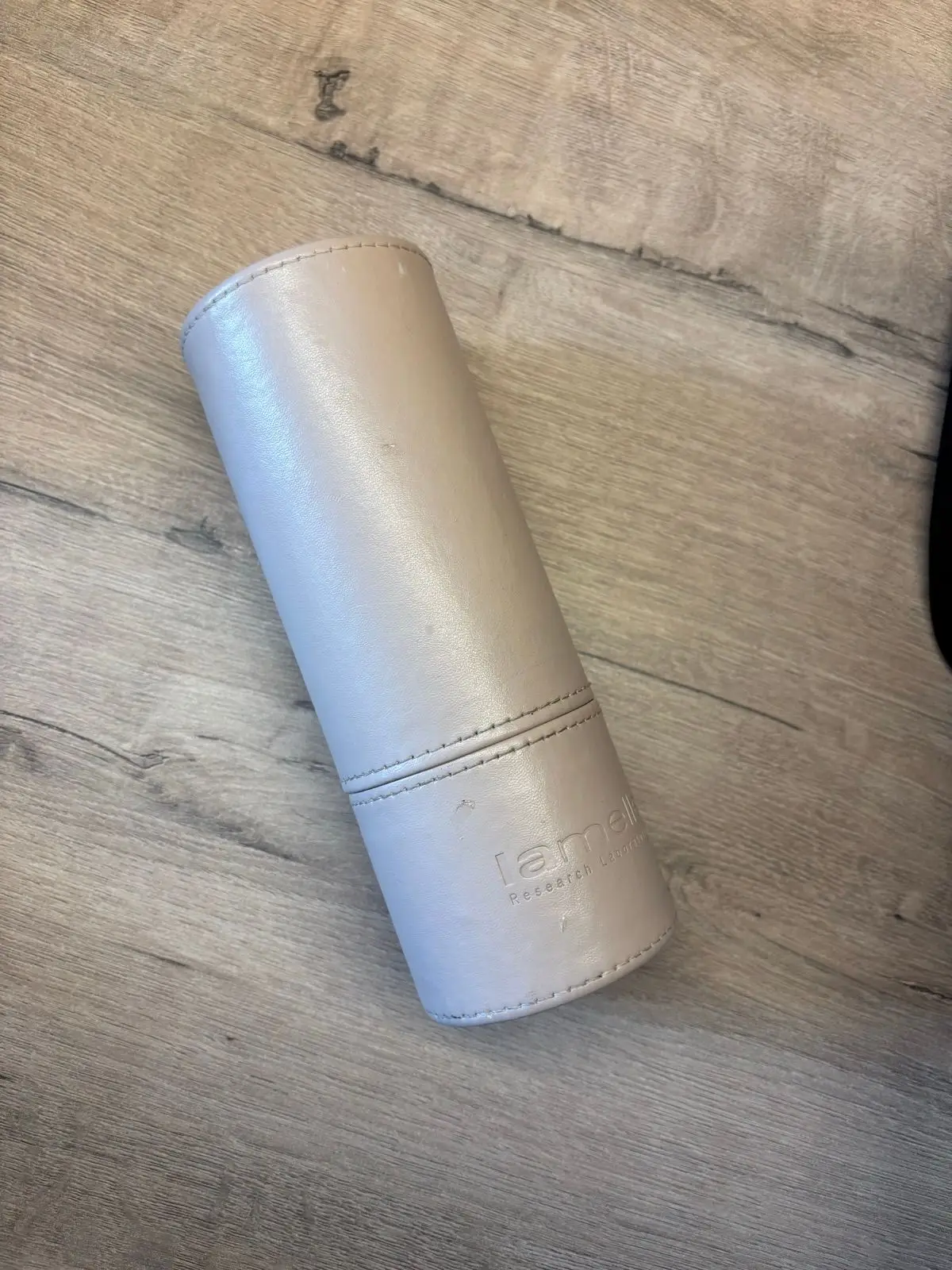 Beige Cylindrical Container