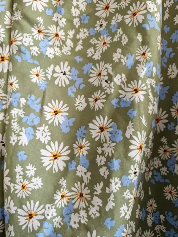 Green floral trousers