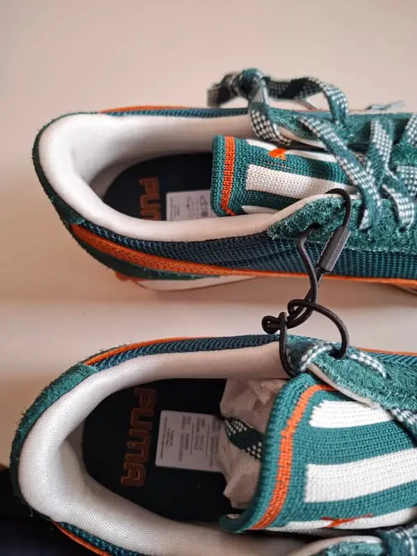 Green original branded Puma tekkie