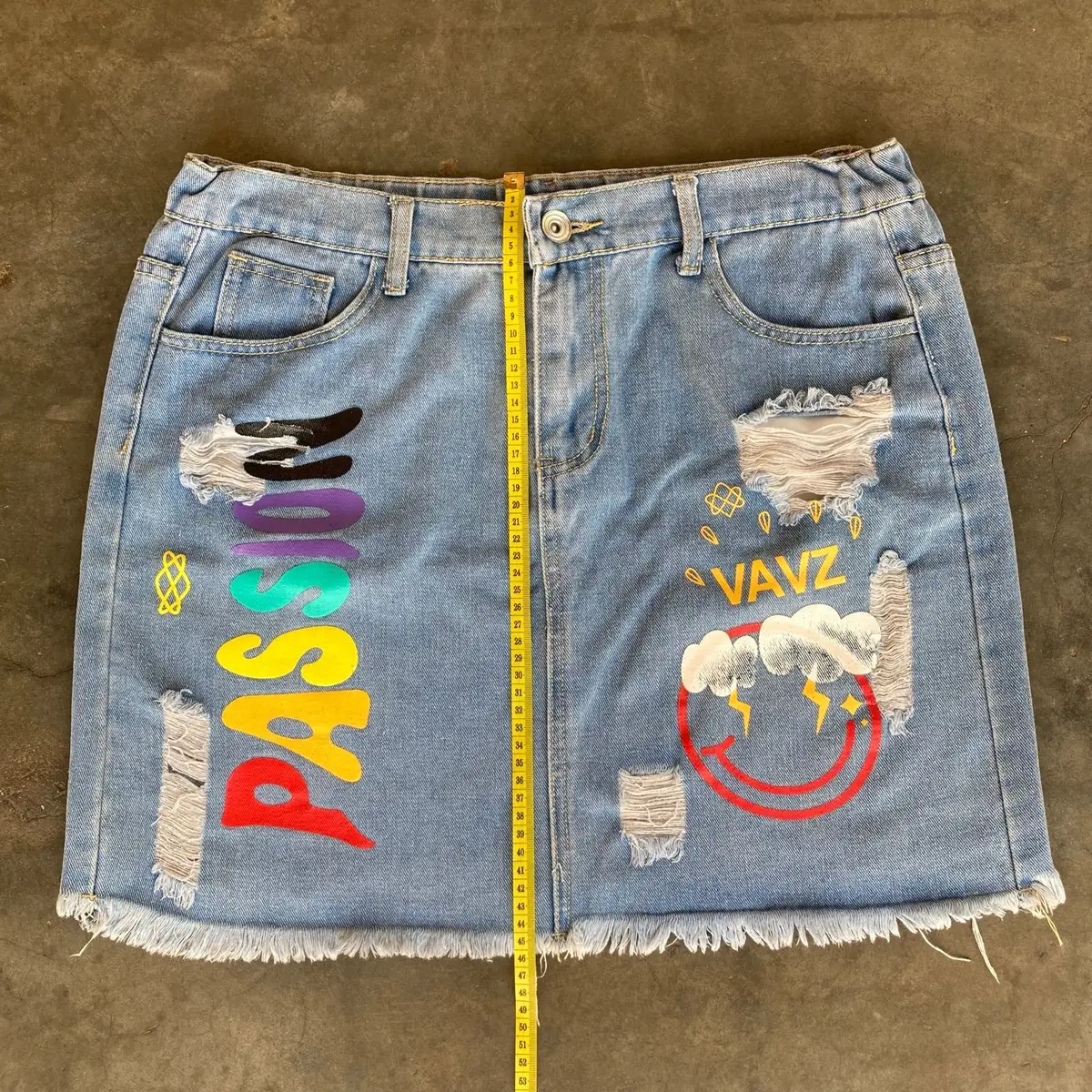 Distressed Denim Skirt with Graphic Print Size 34