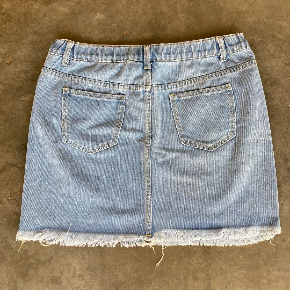 Distressed Denim Skirt with Graphic Print Size 34