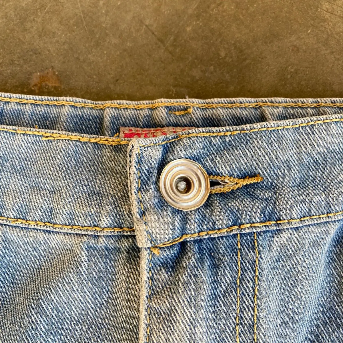 Distressed Denim Skirt with Graphic Print Size 34