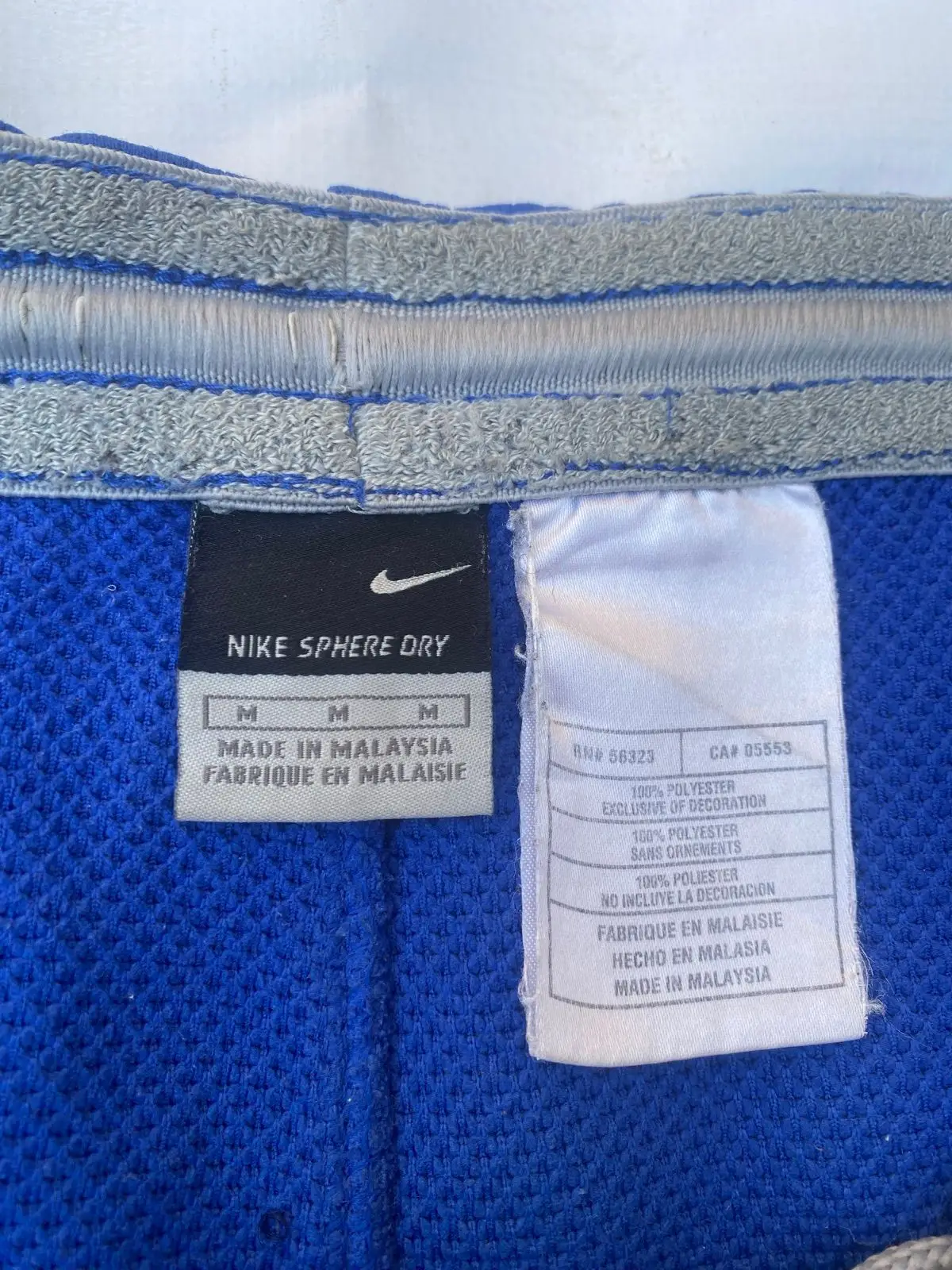 Nike Blue Athletic Shorts with Side Stripes