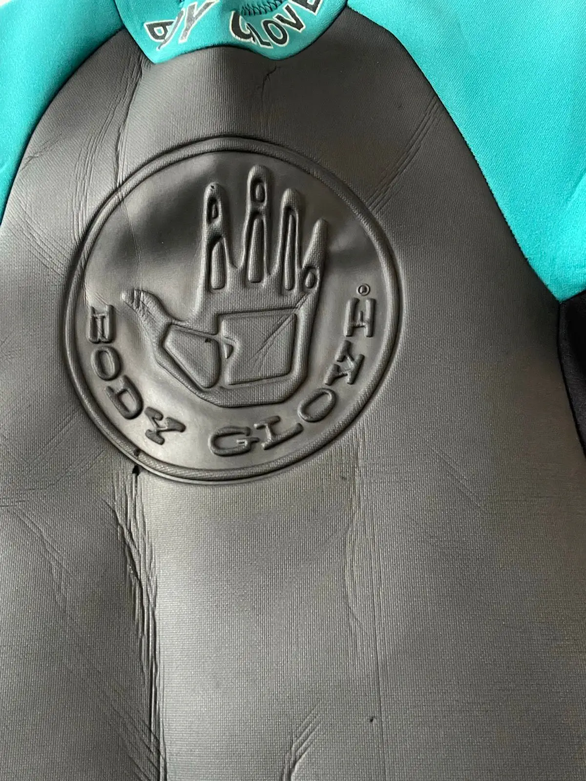 Black and Teal Shorty Wetsuit