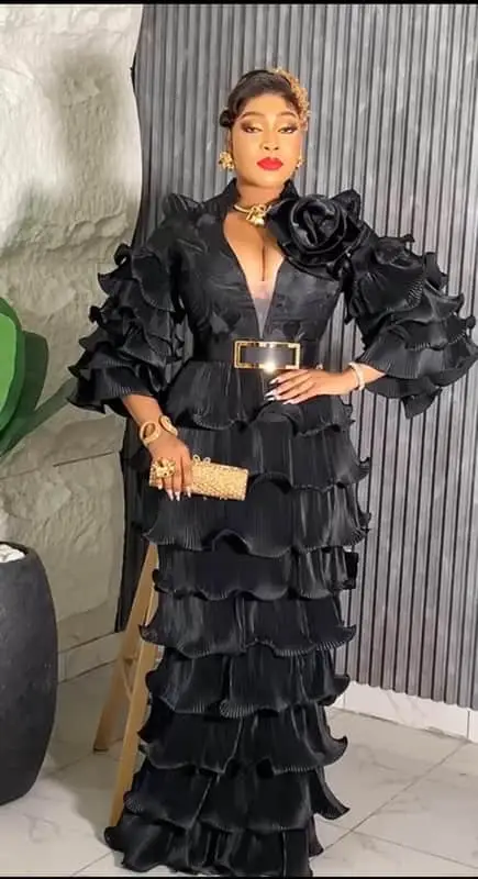 elegant black pleated maxi 2 piece dramatic tiered ruffles and a striking over-sized.
