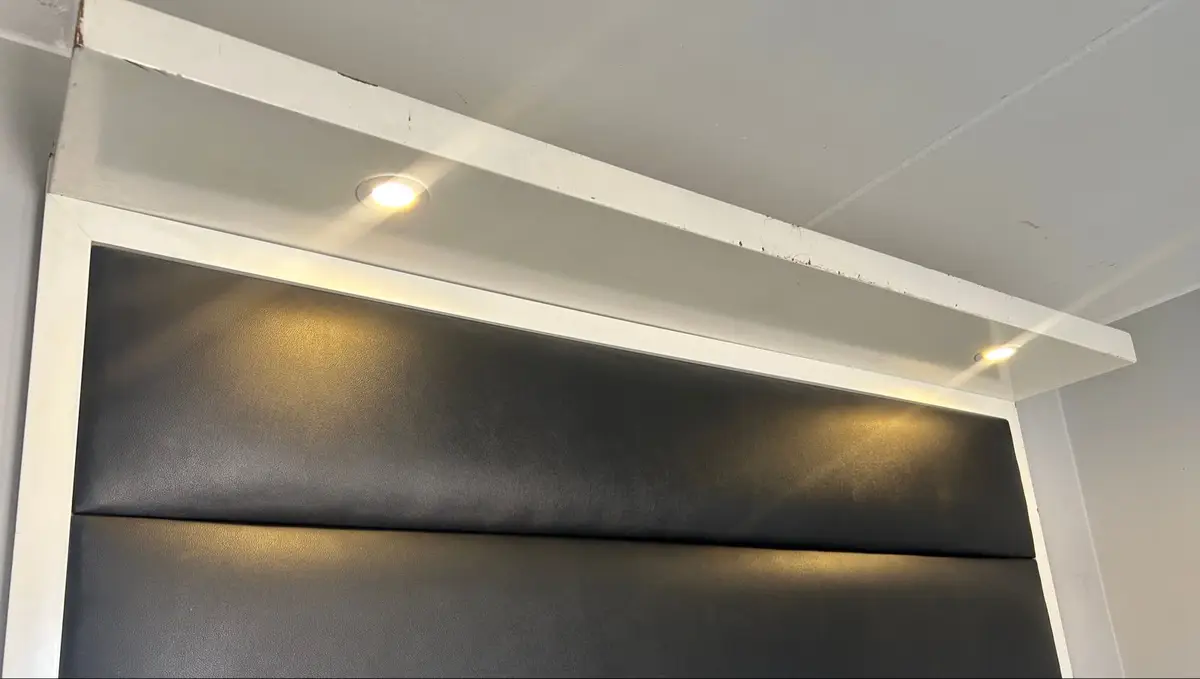 Black Upholstered Headboard with White Frame and Shelf
