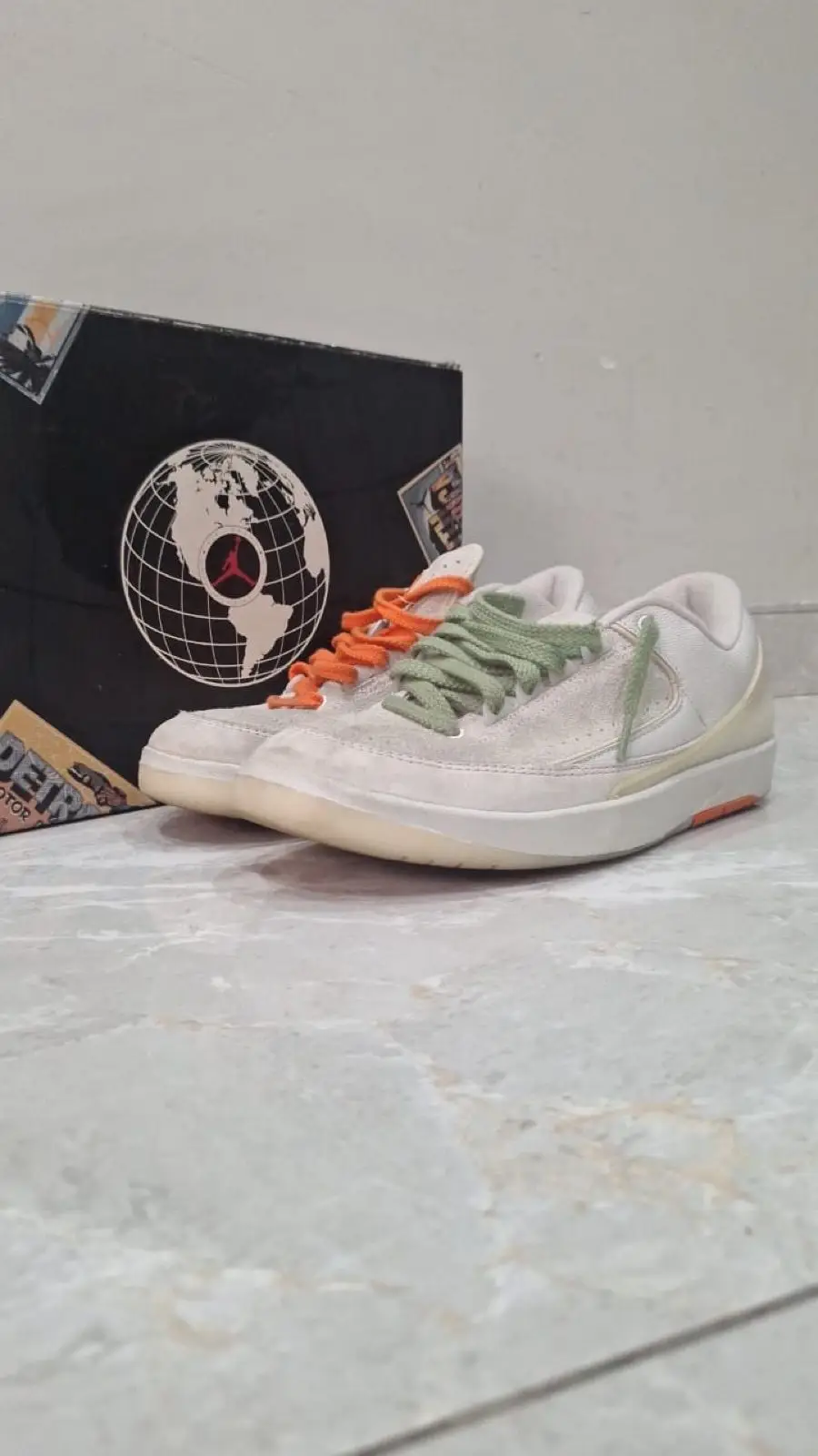 Air Jordan Low Retro Sneakers with Mismatched Laces