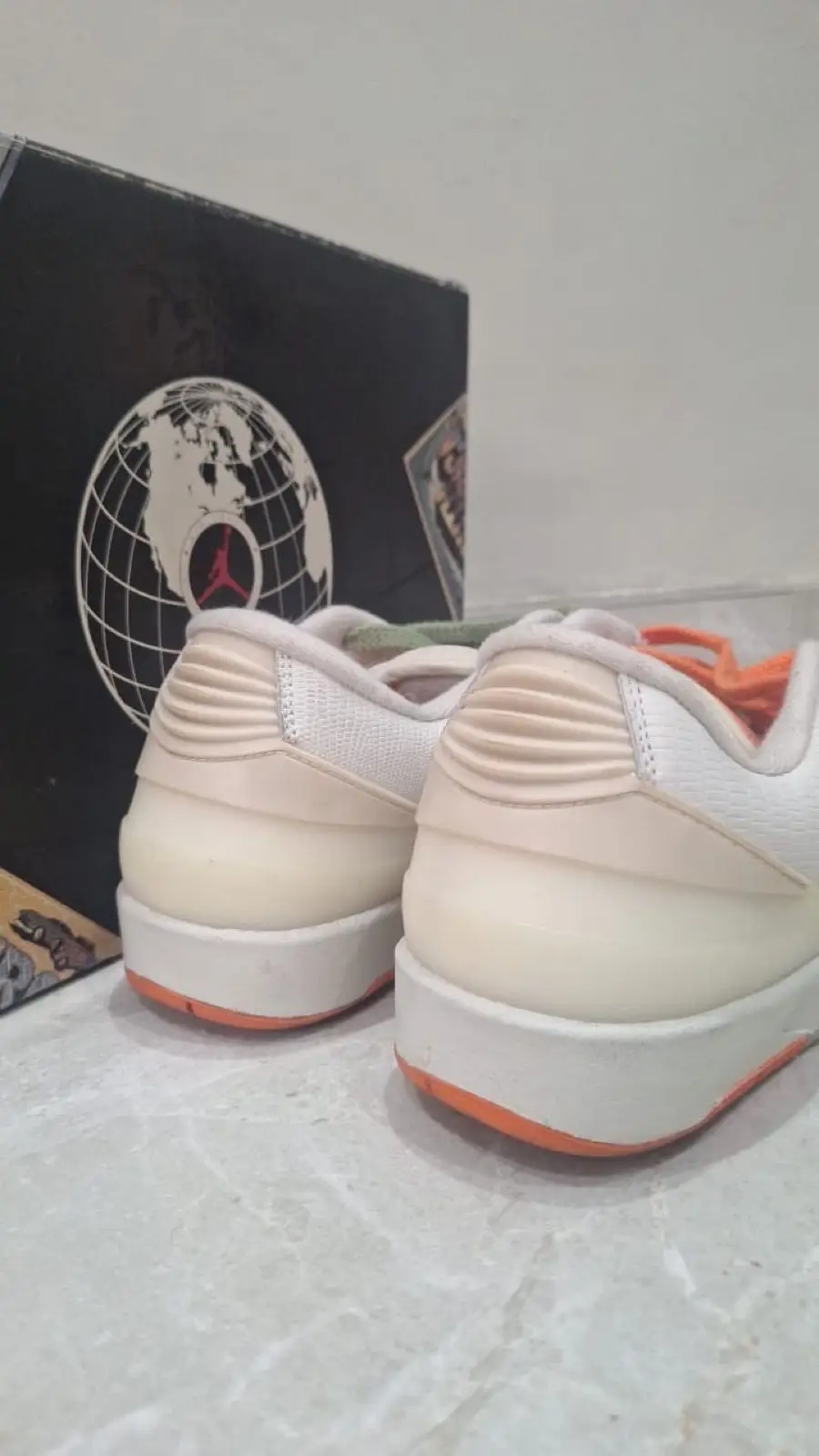 Air Jordan Low Retro Sneakers with Mismatched Laces