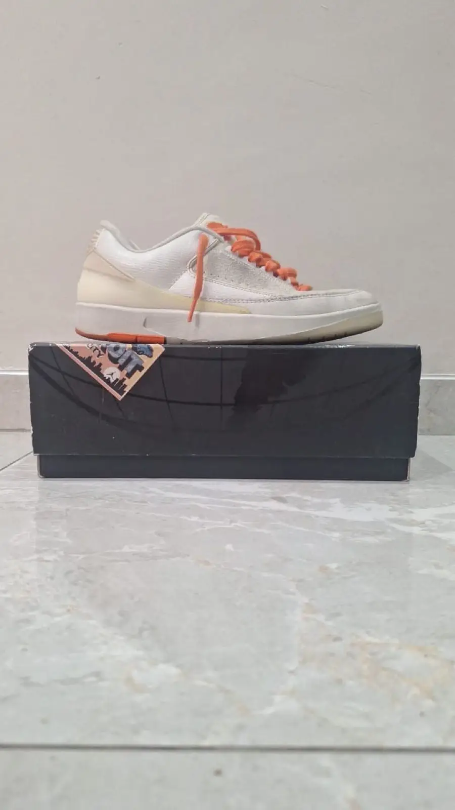 Air Jordan Low Retro Sneakers with Mismatched Laces
