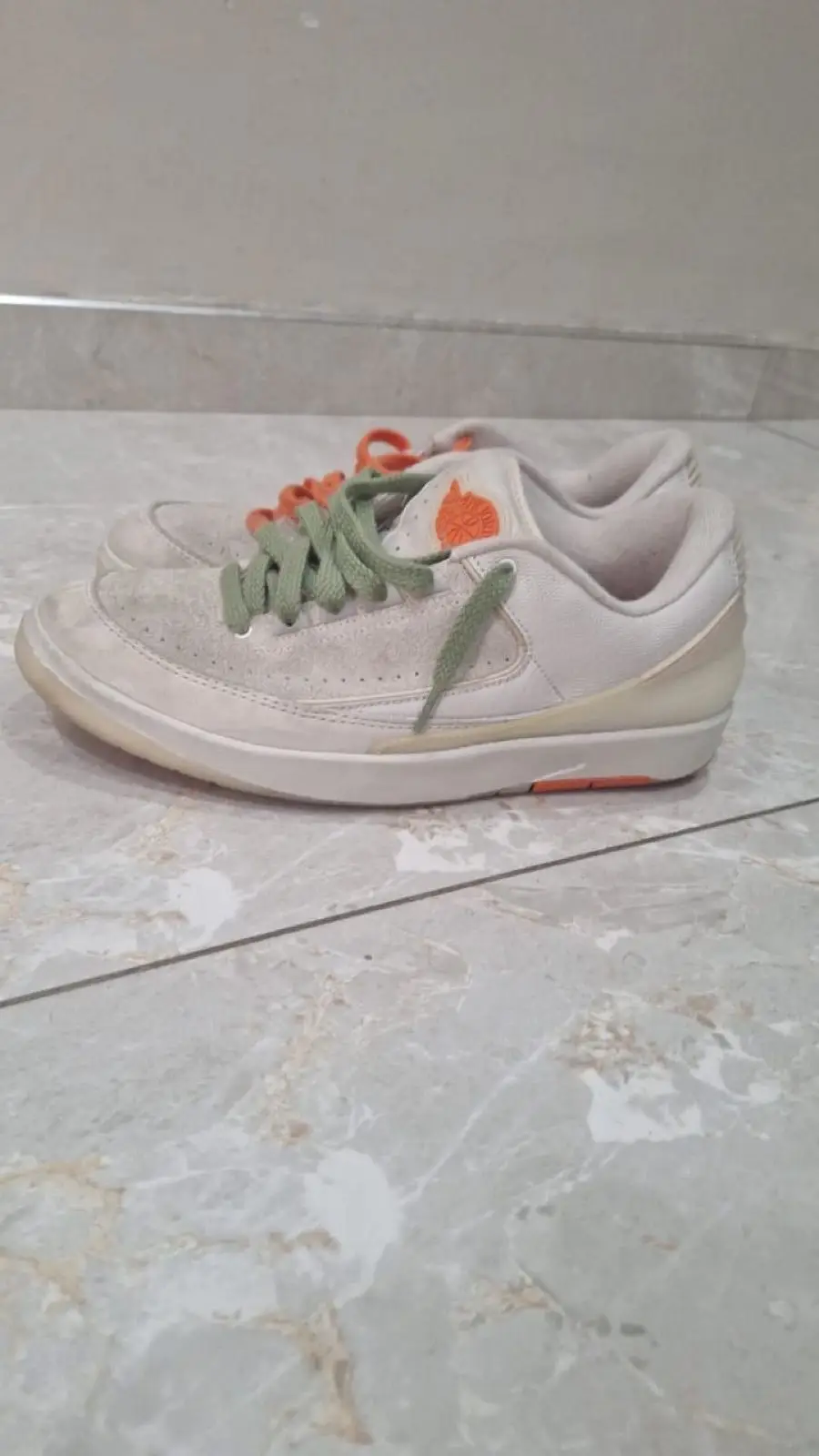 Air Jordan Low Retro Sneakers with Mismatched Laces