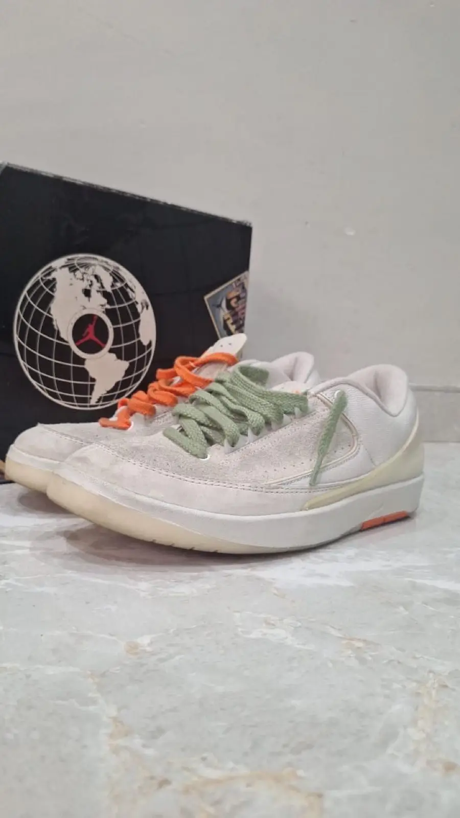 Air Jordan Low Retro Sneakers with Mismatched Laces