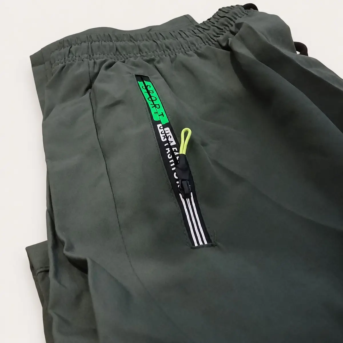 Green Athletic Shorts with Zipper Pockets