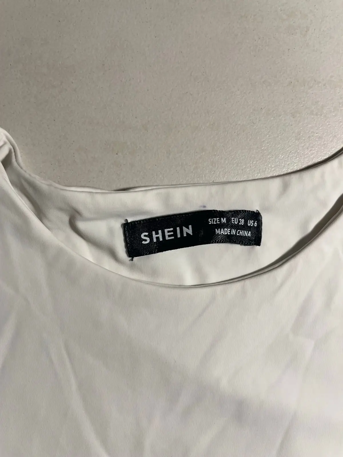 Shein White Sleeveless Bodysuit Size M