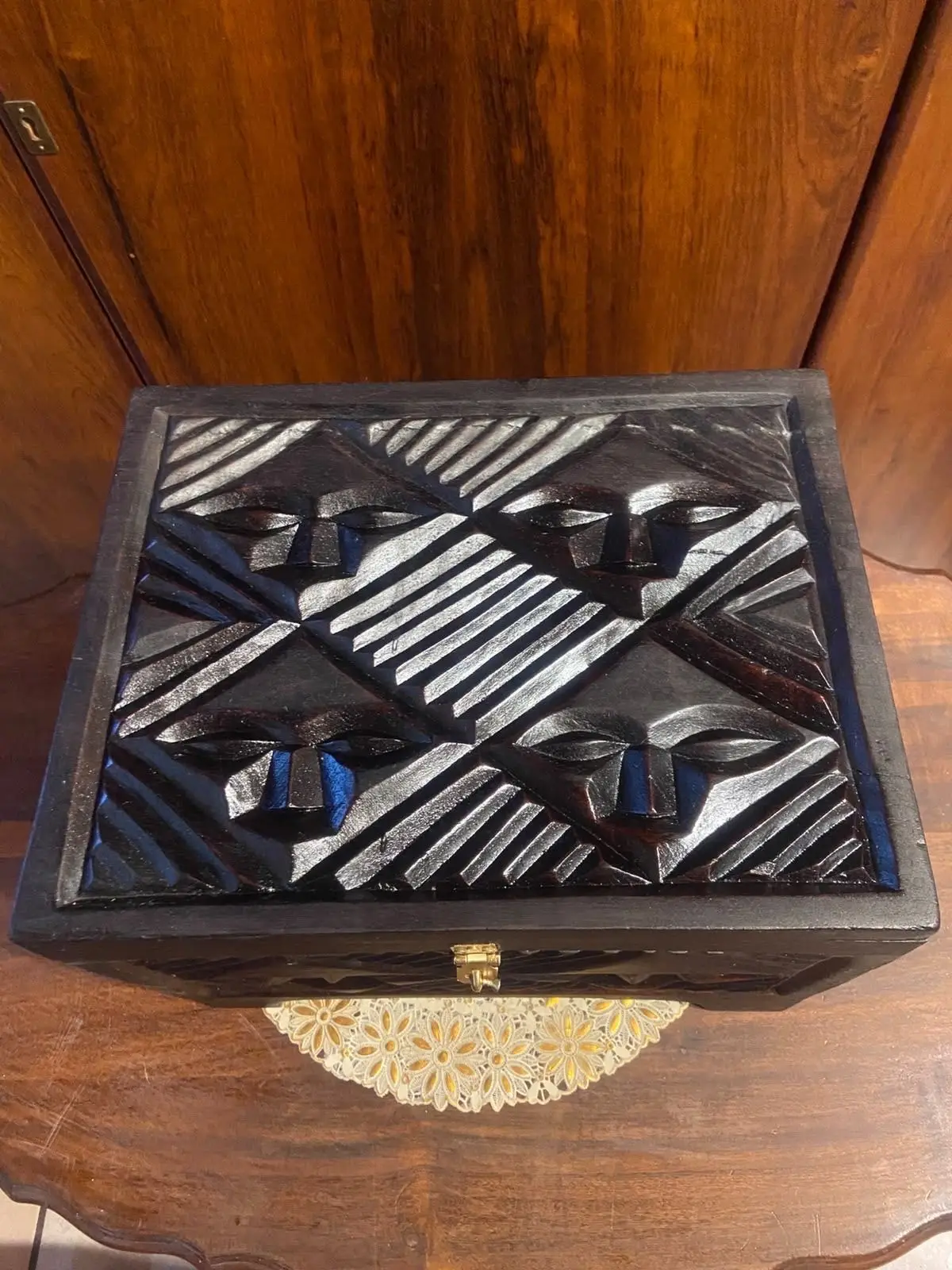 Hand-Carved Wooden Decorative Box with Mask Motifs
