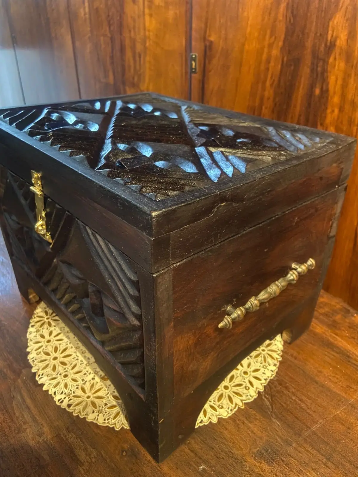 Hand-Carved Wooden Decorative Box with Mask Motifs
