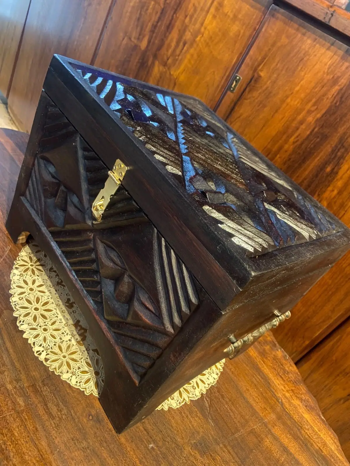 Hand-Carved Wooden Decorative Box with Mask Motifs