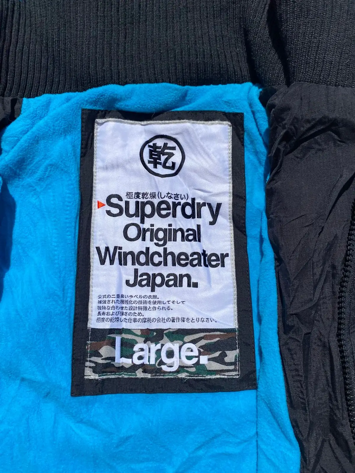Superdry Black Jacket with Blue Lining