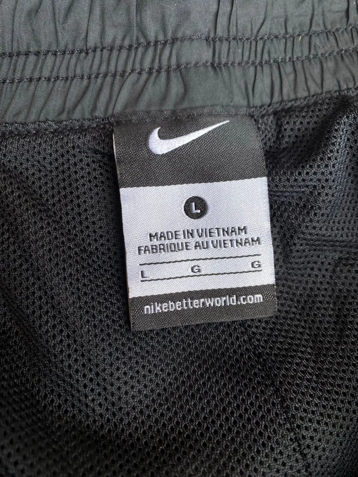 Nike Black Track Pants with White Side Stripes