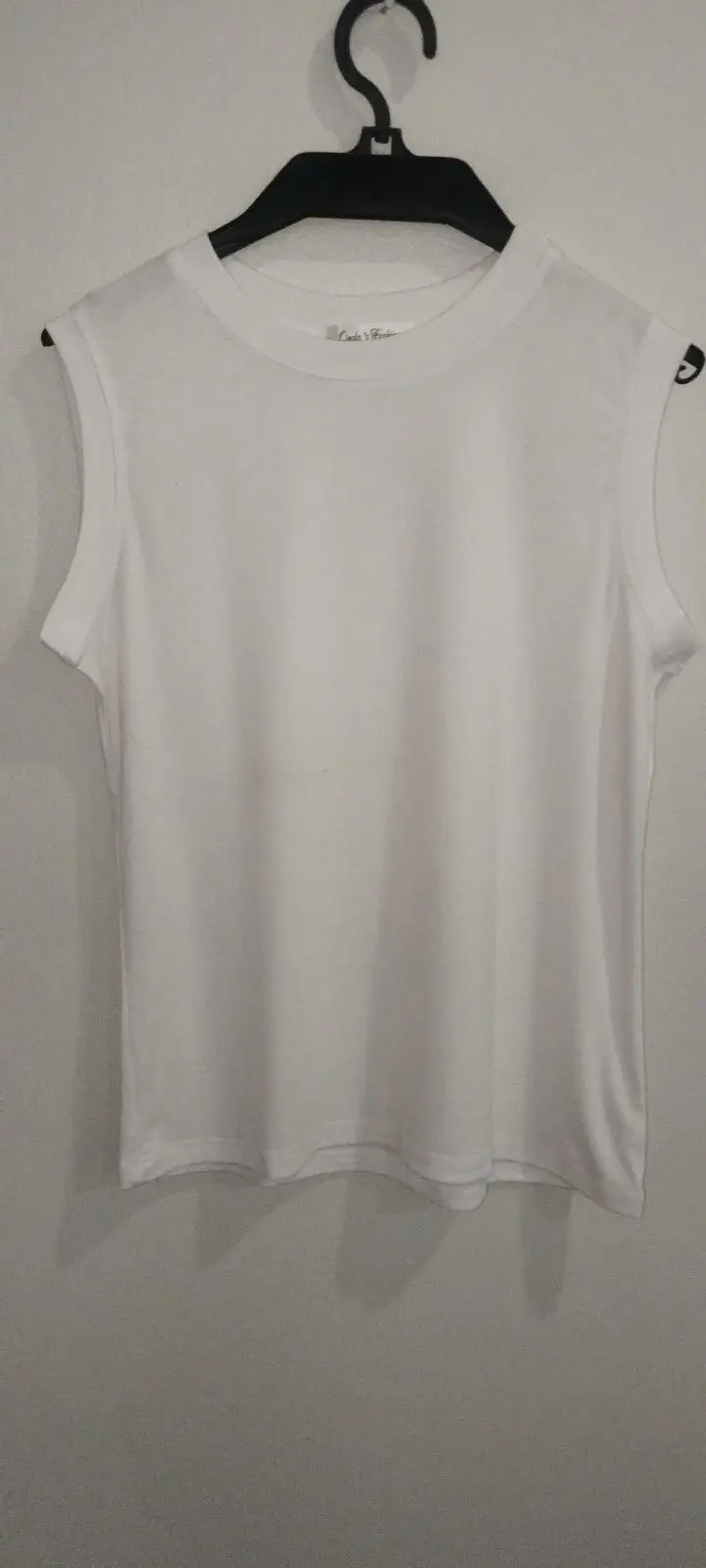 Cinda's Fashions White Sleeveless Top