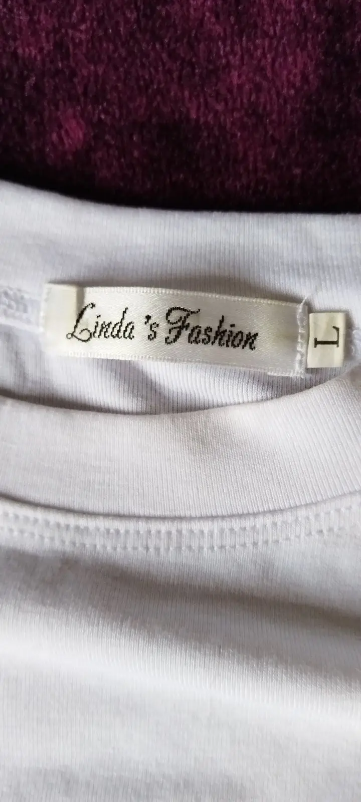 Cinda's Fashions White Sleeveless Top