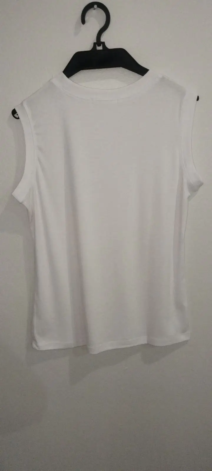 Cinda's Fashions White Sleeveless Top